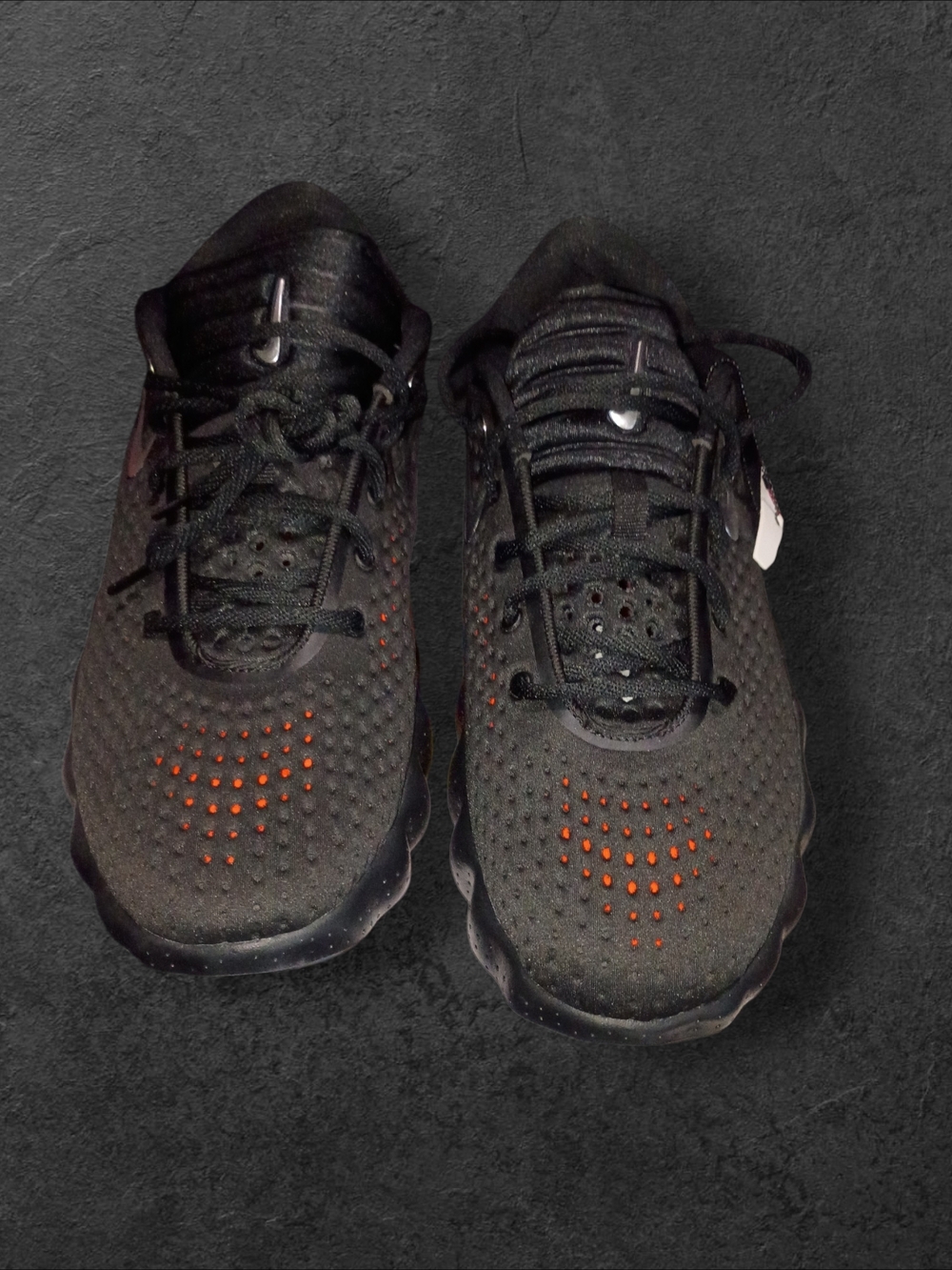 Nike Men's Black Sneakers with Orange Detailing